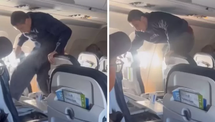 Uçak koltuğunu tekme atarak kırmaya çalışan yolcu diğer yolcular tarafından etksiz hale geitirildi