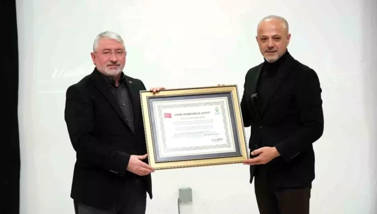 Başkan Aşgın’a yalnız bırakmadığı Afşin’de fahri hemşehrilik beratı verildi