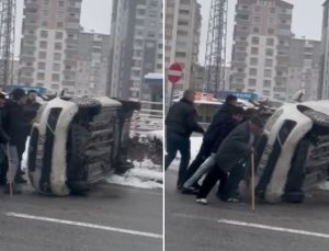 Vatandaşlardan kurtarma operasyonu! Yan yatan aracı iterek düzelttiler